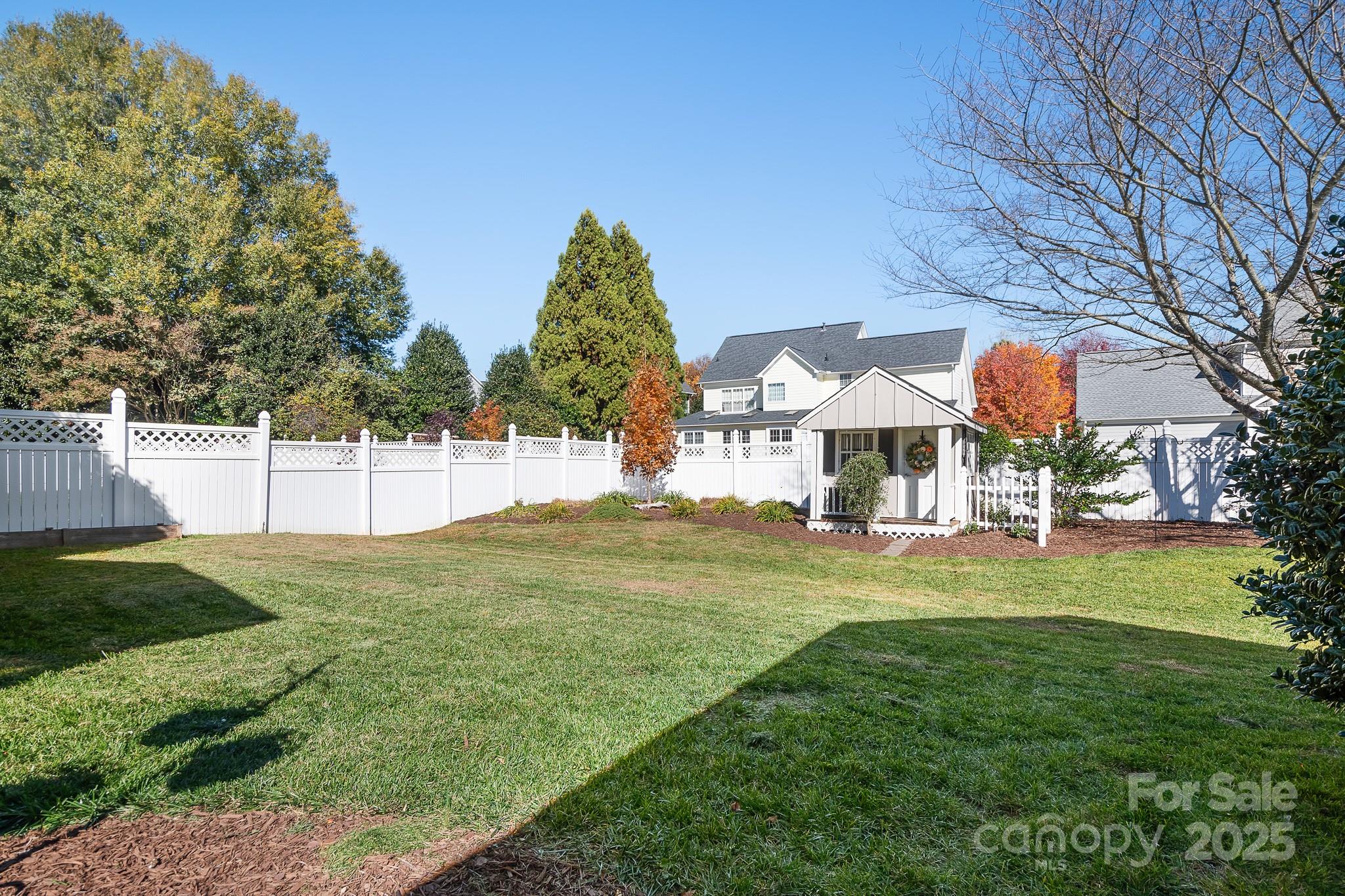 15826 Trenton Place Road Huntersville, NC 28078 - Photo 21 of 32 a view of a house with a yard