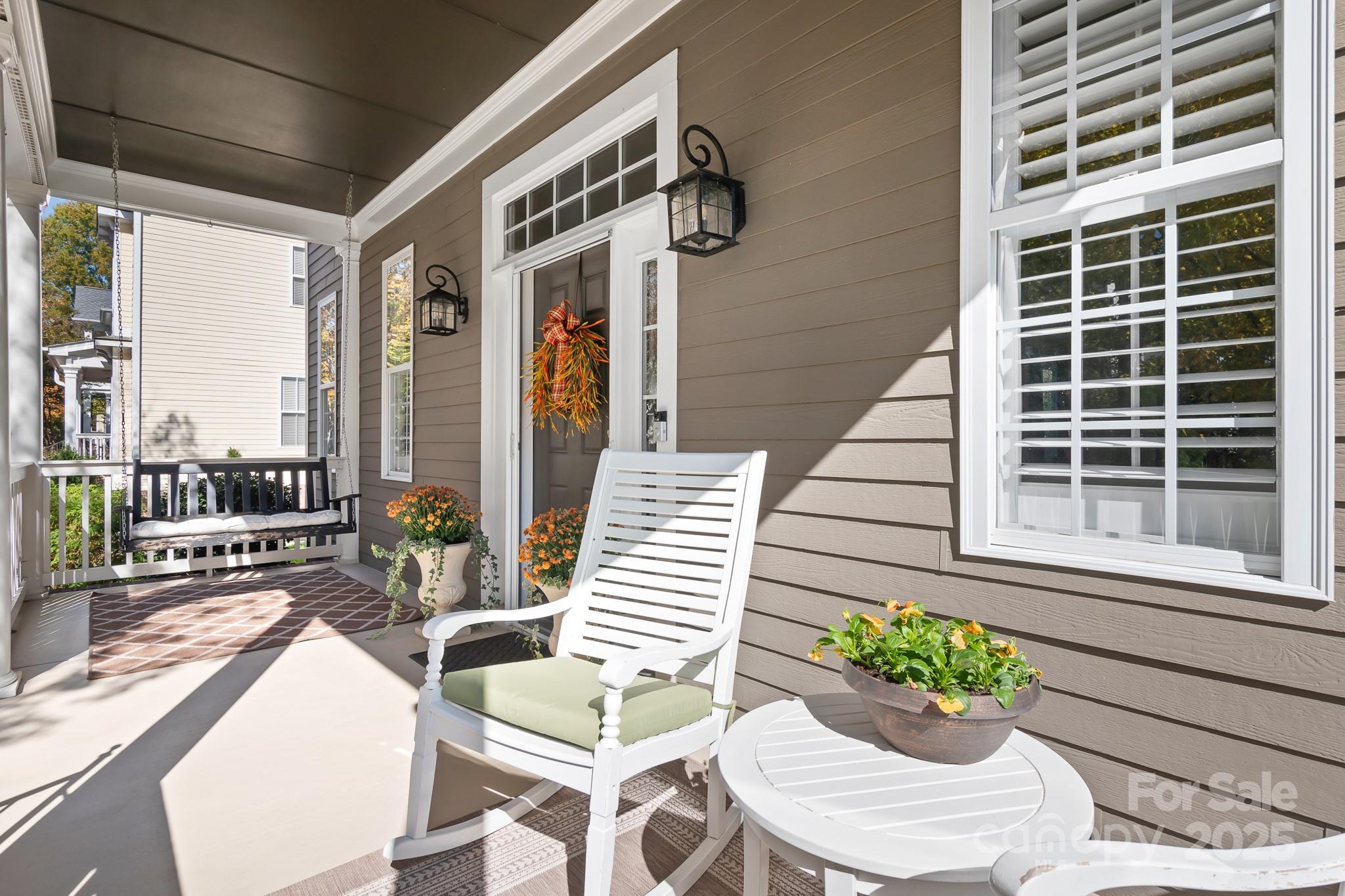 15826 Trenton Place Road Huntersville, NC 28078 - Photo 31 of 32 a balcony with furniture and a potted plant