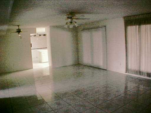 5218 Wooldridge Road Corpus Christi, TX 78413 - Photo 5 of 10 a view of a room with a fireplace