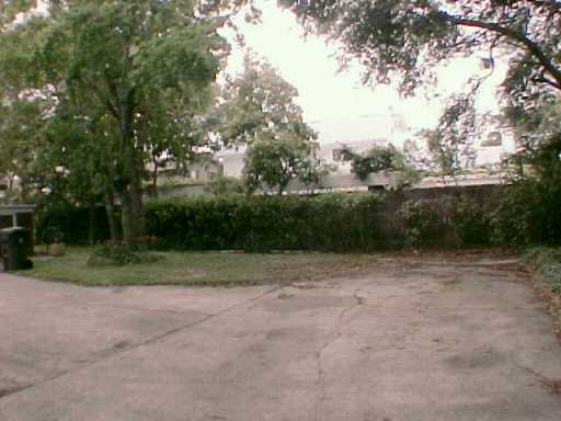 5218 Wooldridge Road Corpus Christi, TX 78413 - Photo 9 of 10 a view of outdoor space with trees