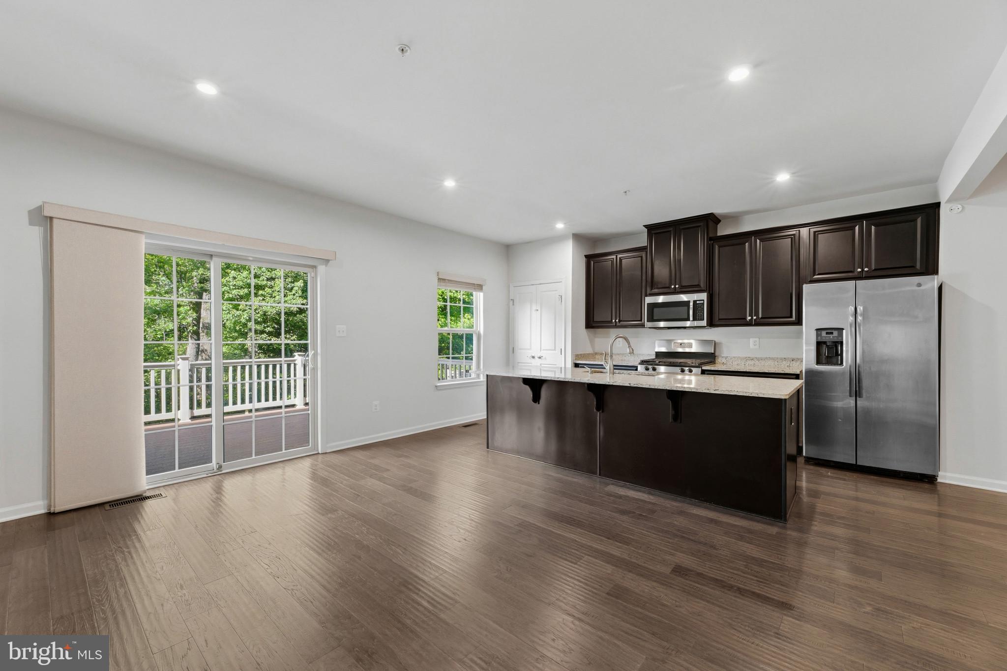 2720 Fredericksburg Road Hanover, MD 21076 - Photo 12 of 45 Dining Area & Kitchen with Sliders to Deck