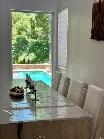 a view of kitchen living room and patio