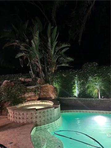 a balcony with furniture and garden