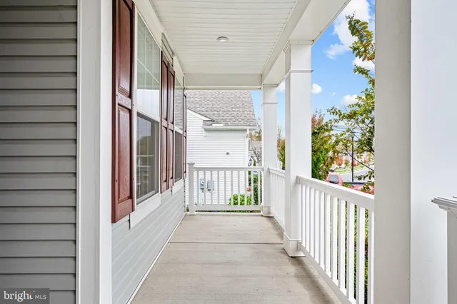 a view of a workspace with wooden floor