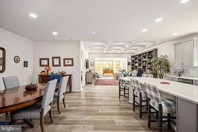 a spacious bedroom with a bed and a window