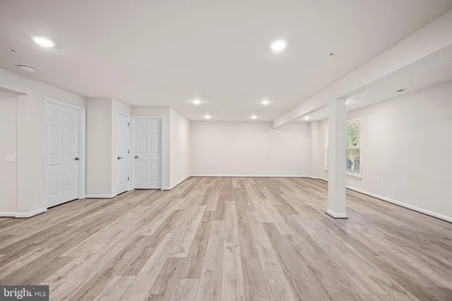 a view of a fountain in front of a house