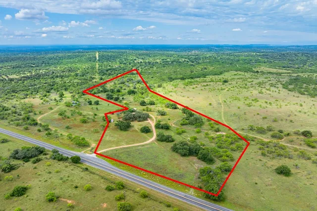 a view of a pool with a ocean view