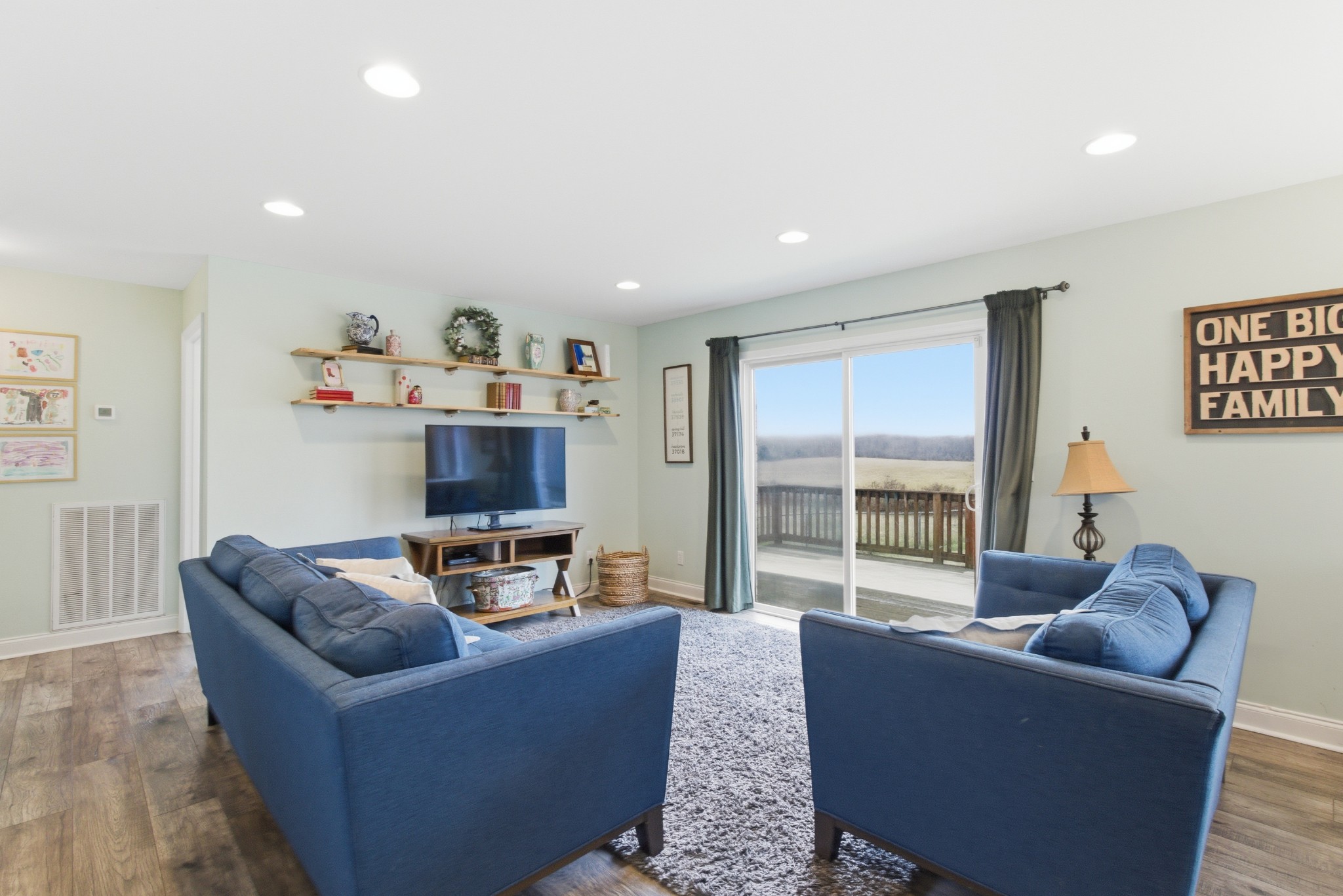 558 Ferrells Loop Road Beechgrove, TN 37018 - Photo 15 of 46 a living room with furniture and a window