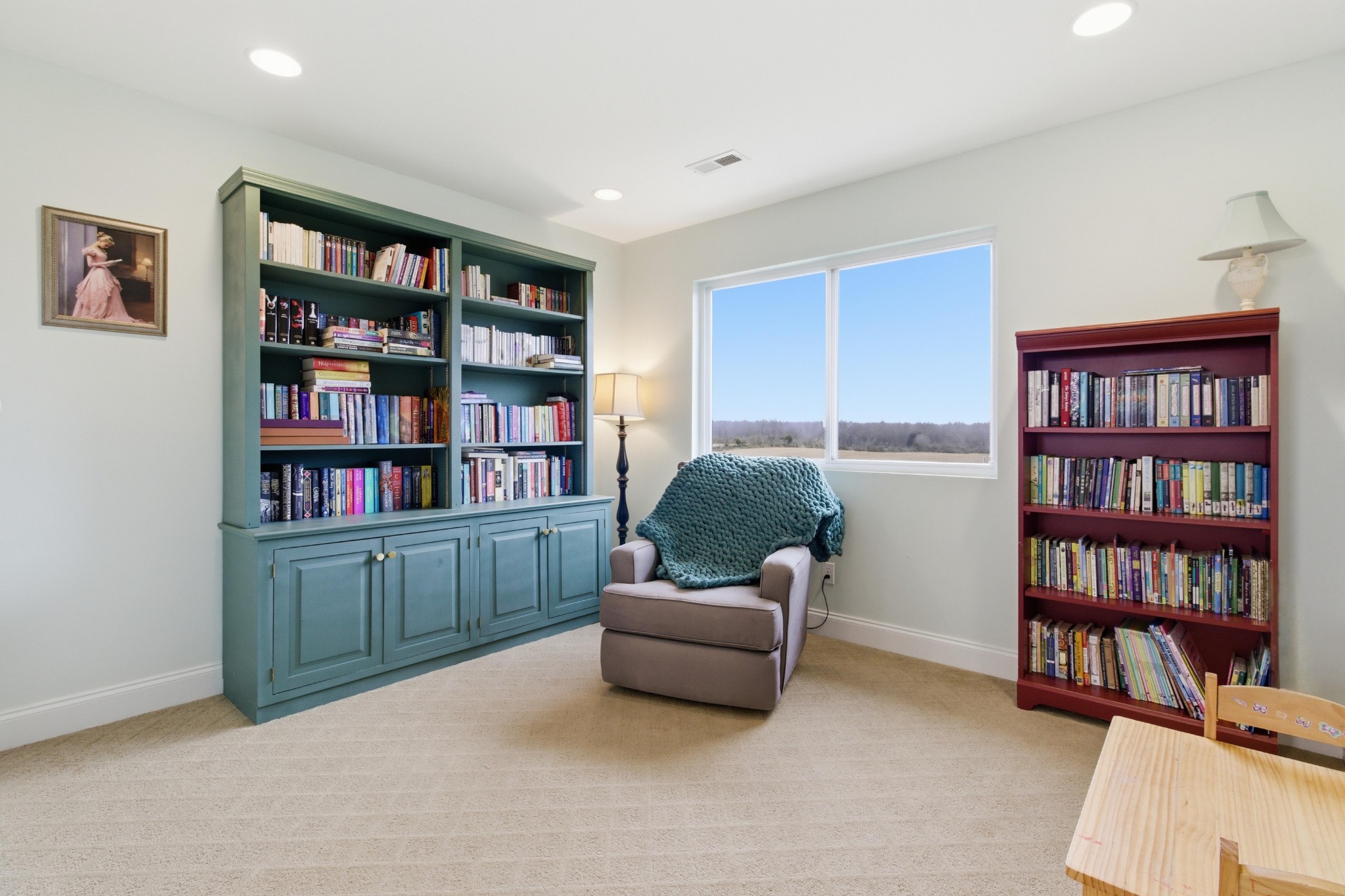 558 Ferrells Loop Road Beechgrove, TN 37018 - Photo 23 of 46 a livingroom with a bookshelf