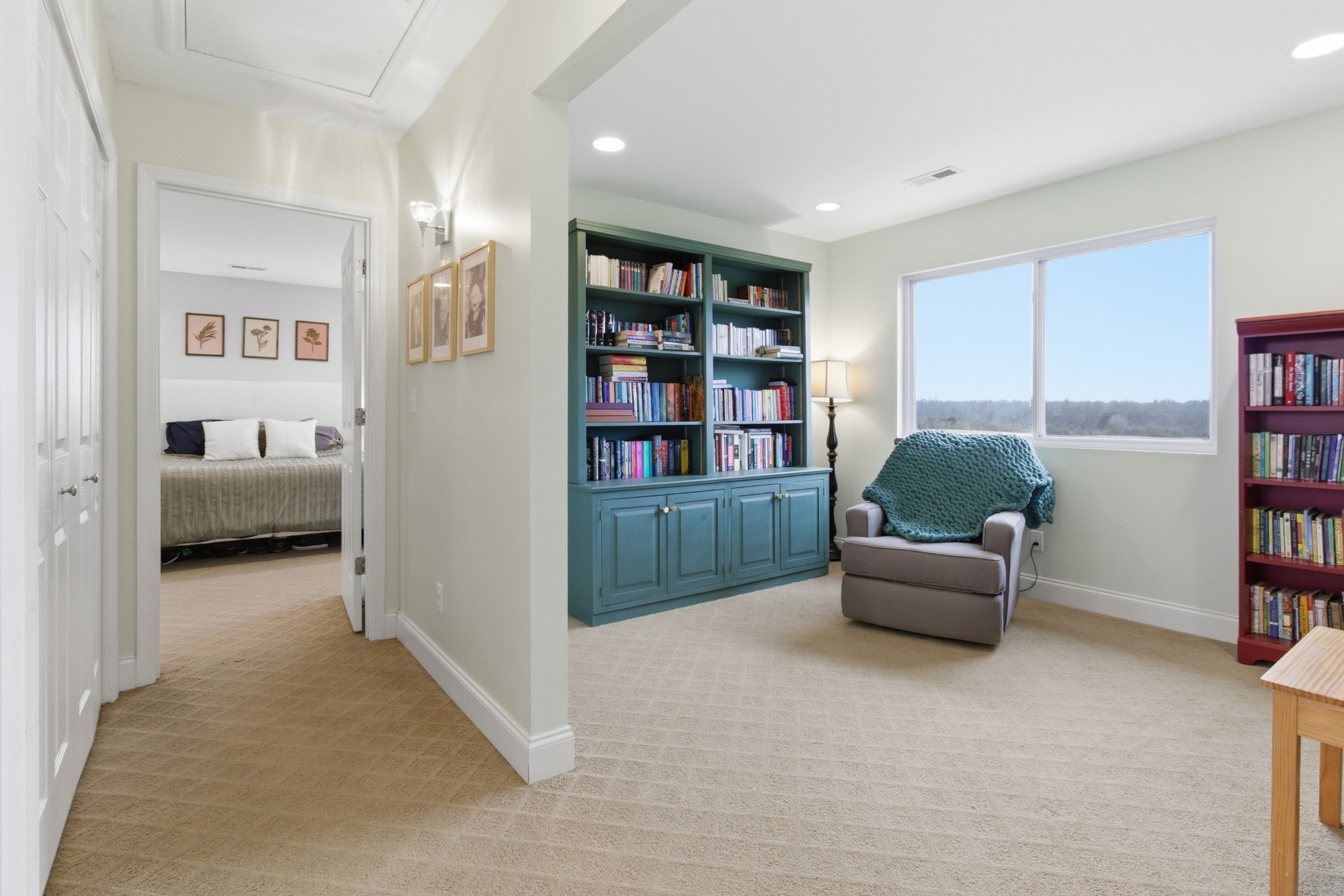 558 Ferrells Loop Road Beechgrove, TN 37018 - Photo 24 of 46 a living room with furniture and a book shelf