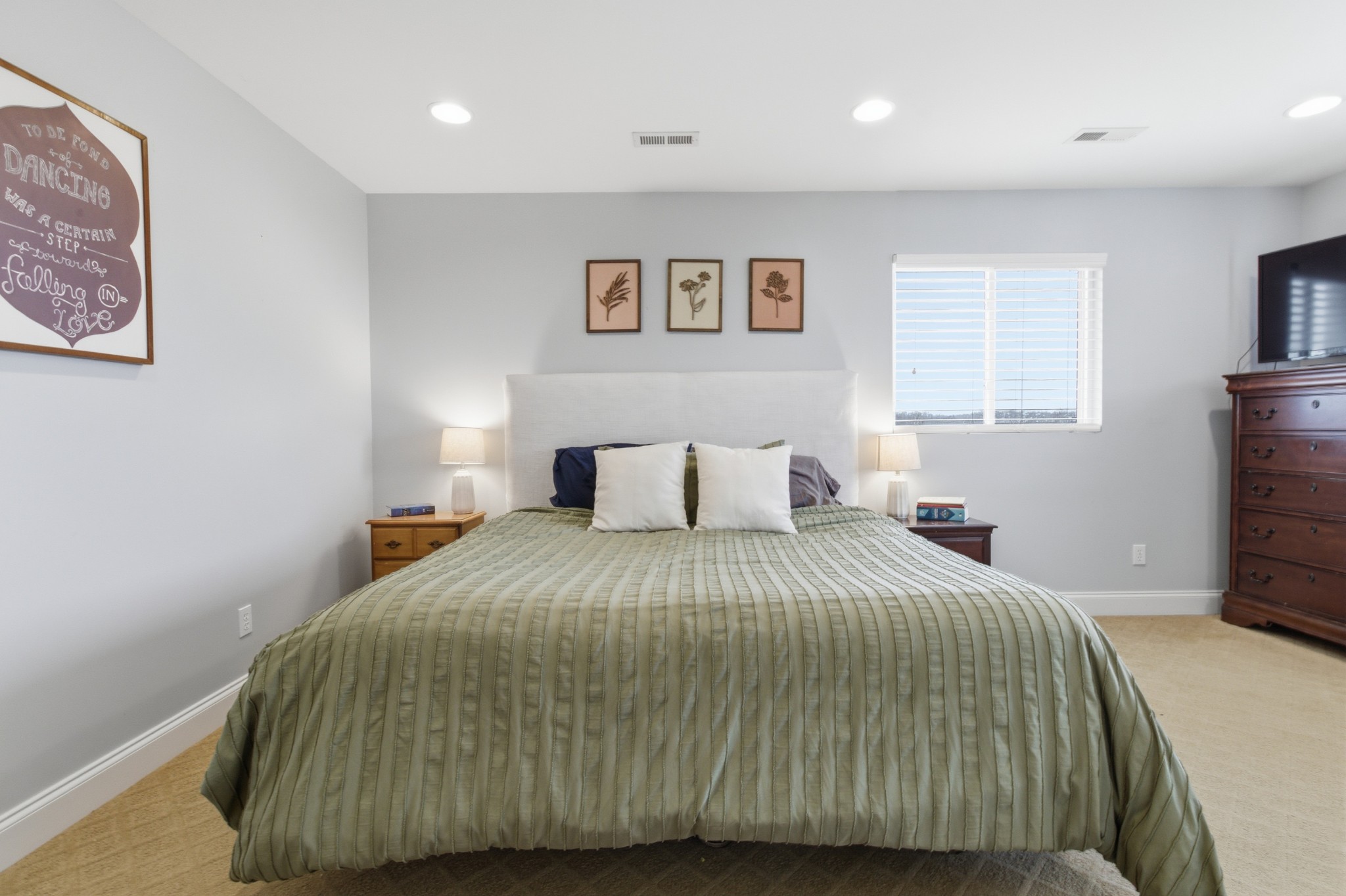 558 Ferrells Loop Road Beechgrove, TN 37018 - Photo 25 of 46 a bedroom with a bed and a night stand