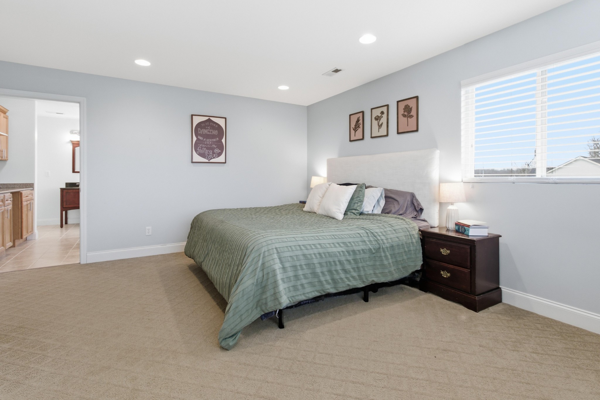 558 Ferrells Loop Road Beechgrove, TN 37018 - Photo 27 of 46 a bedroom with a bed and a night stand