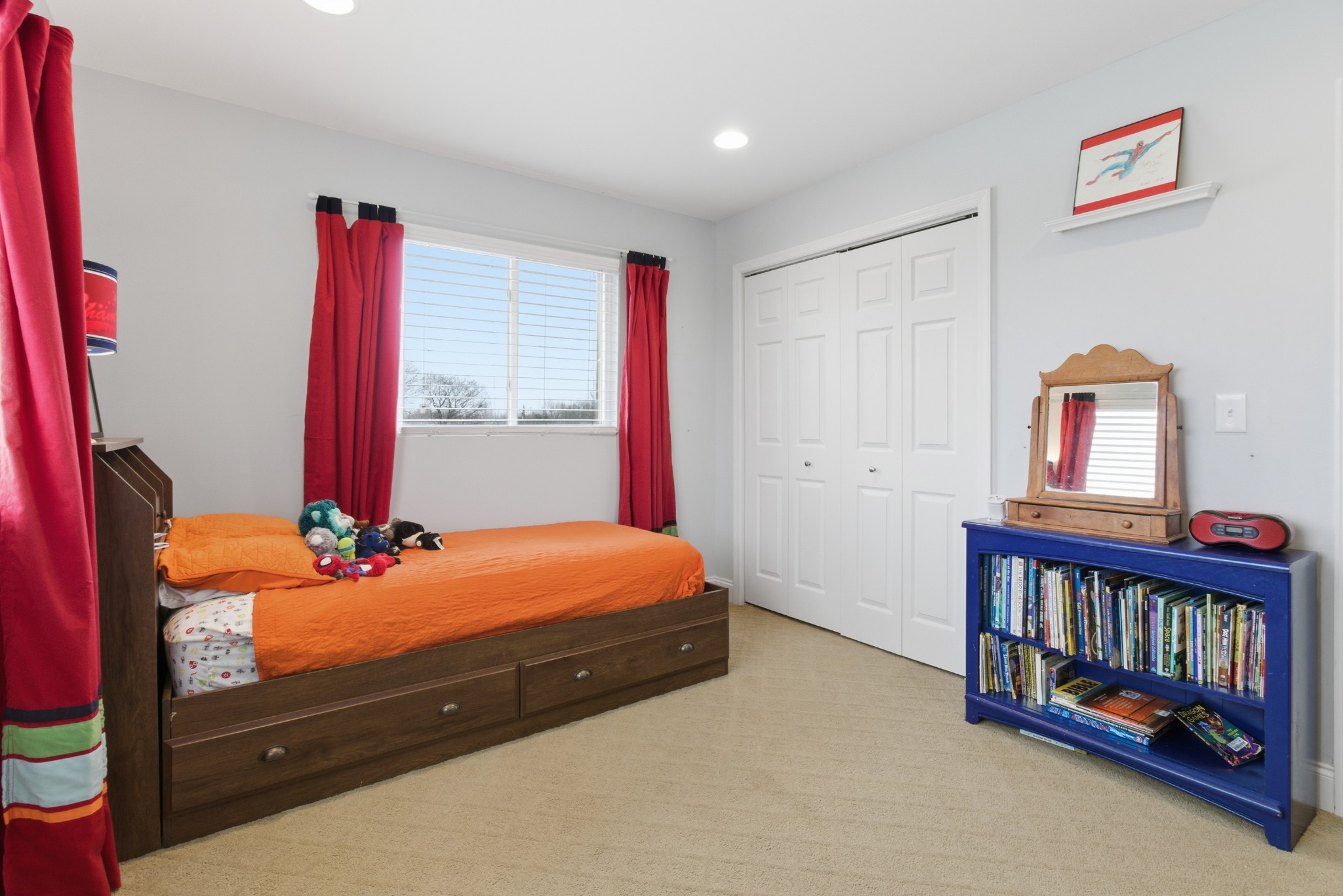 558 Ferrells Loop Road Beechgrove, TN 37018 - Photo 33 of 46 a bedroom with furniture and a book shelf