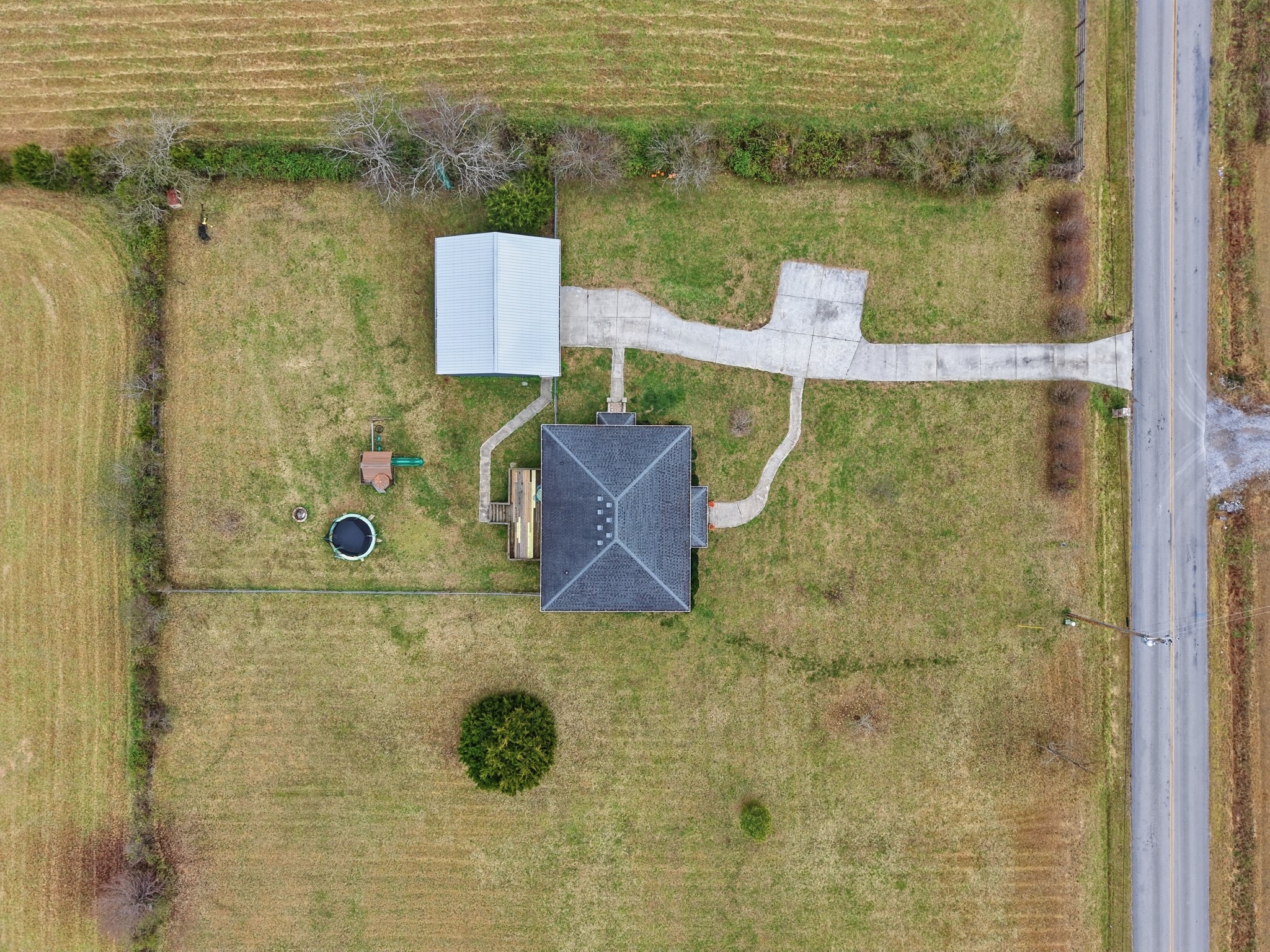 558 Ferrells Loop Road Beechgrove, TN 37018 - Photo 43 of 46 a wooden cabinet sitting in front of a bathroom