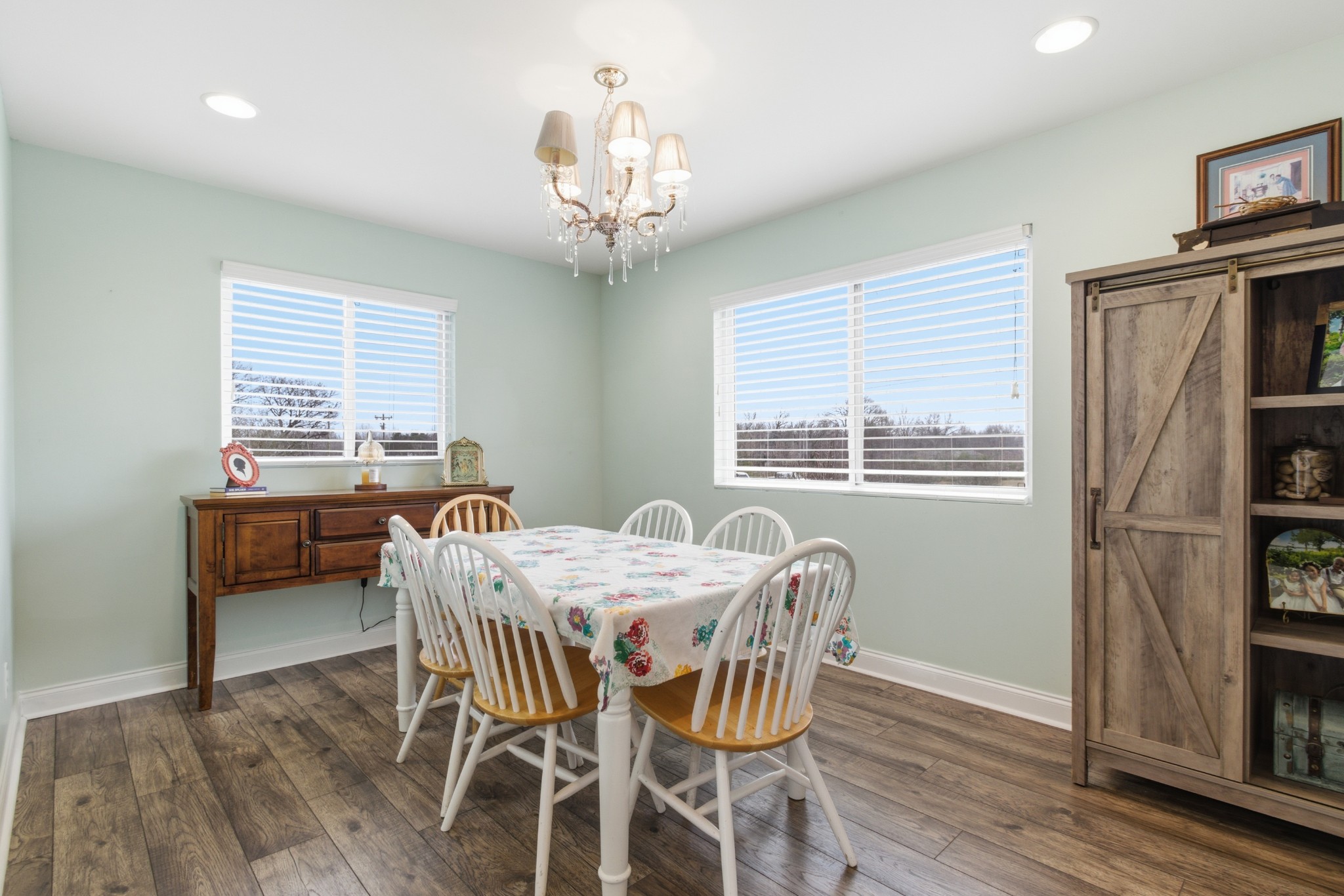 558 Ferrells Loop Road Beechgrove, TN 37018 - Photo 9 of 46 a view of a dining room with furniture window and wooden floor