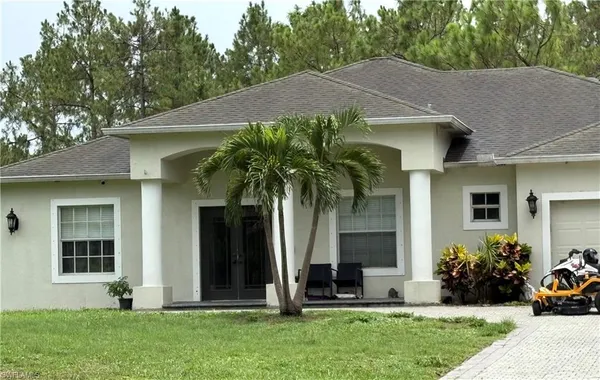 a front view of house with yard