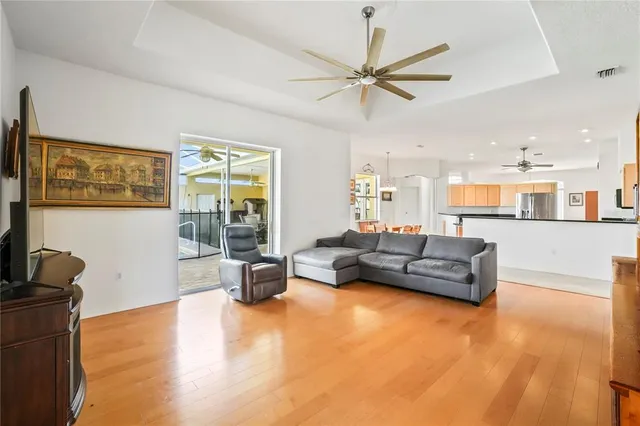 a large kitchen with a table and chairs