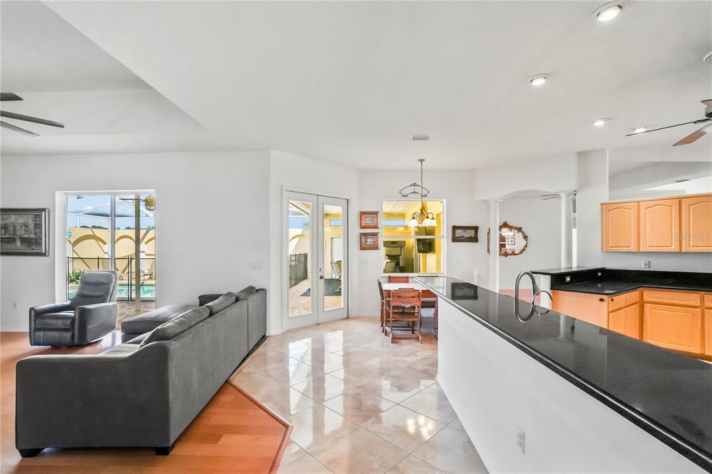 3441 Cedar Crest Loop Spring Hill, FL 34609 - Photo 27 of 58 a living room with furniture and a large window