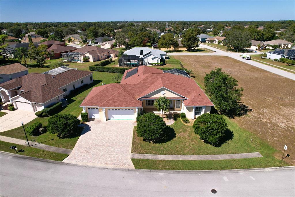 3441 Cedar Crest Loop Spring Hill, FL 34609 - Photo 56 of 58 an aerial view of residential houses and outdoor space