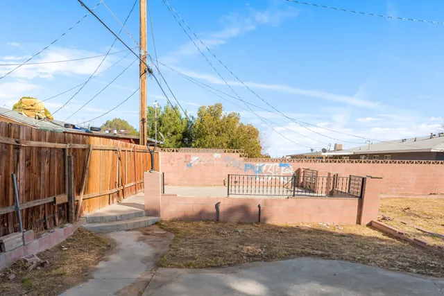 a view of balcony with floor to ceiling windows