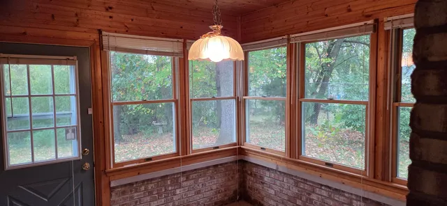 a bathroom with a sink and shower