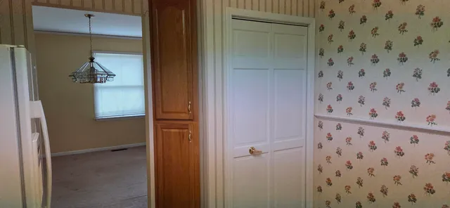 a bathroom with a shower and a sink