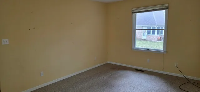 an empty room with a window