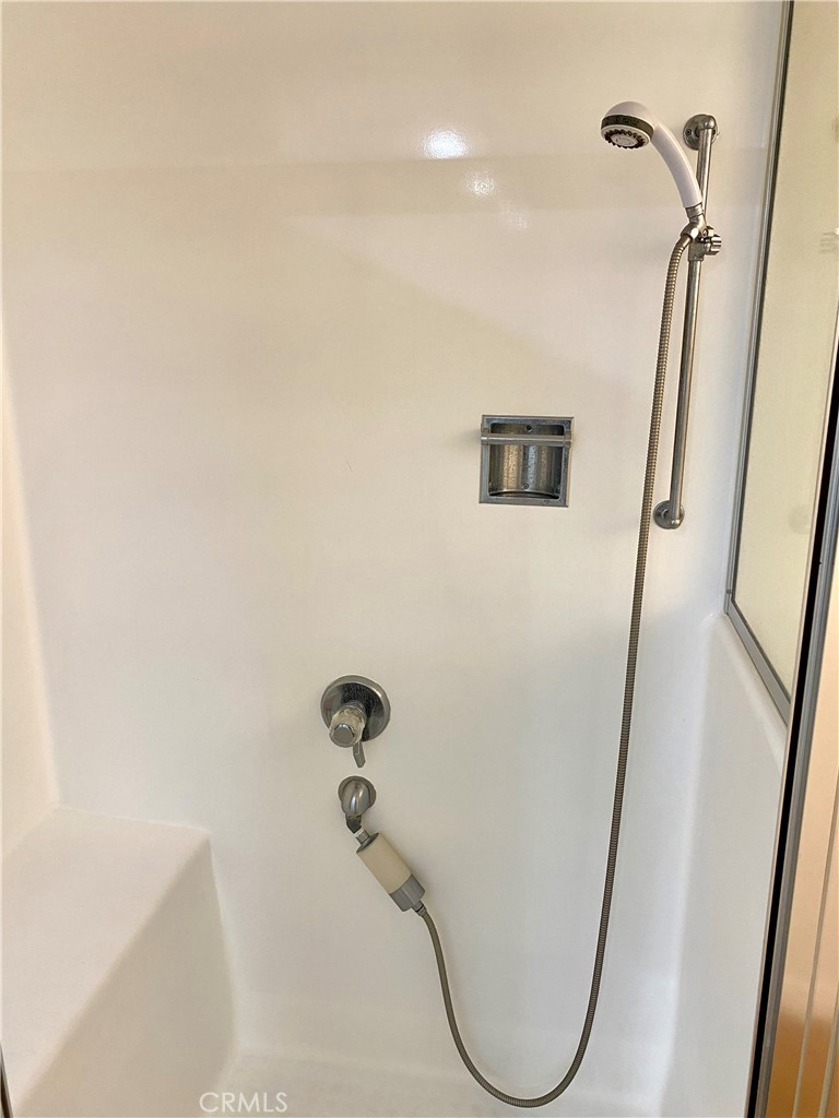 1312 Golden Rain Road Seal Beach, CA 90740 - Photo 15 of 38 easy step-in shower with seat