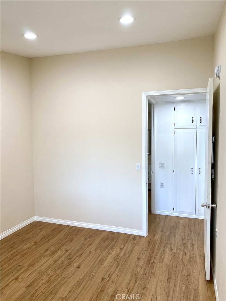 1312 Golden Rain Road Seal Beach, CA 90740 - Photo 18 of 38 main bedroom with vaulted ceilings, and recessed lighting