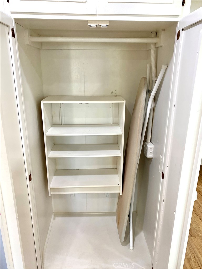 1312 Golden Rain Road Seal Beach, CA 90740 - Photo 9 of 38 storage closet in hallway