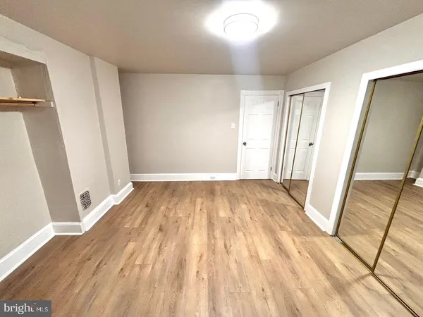 a view of a hallway with a chandelier