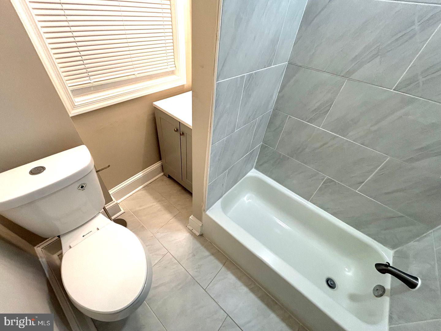 3023 Redner Street Philadelphia, PA 19121 - Photo 6 of 22 a bathroom with a sink toilet and shower