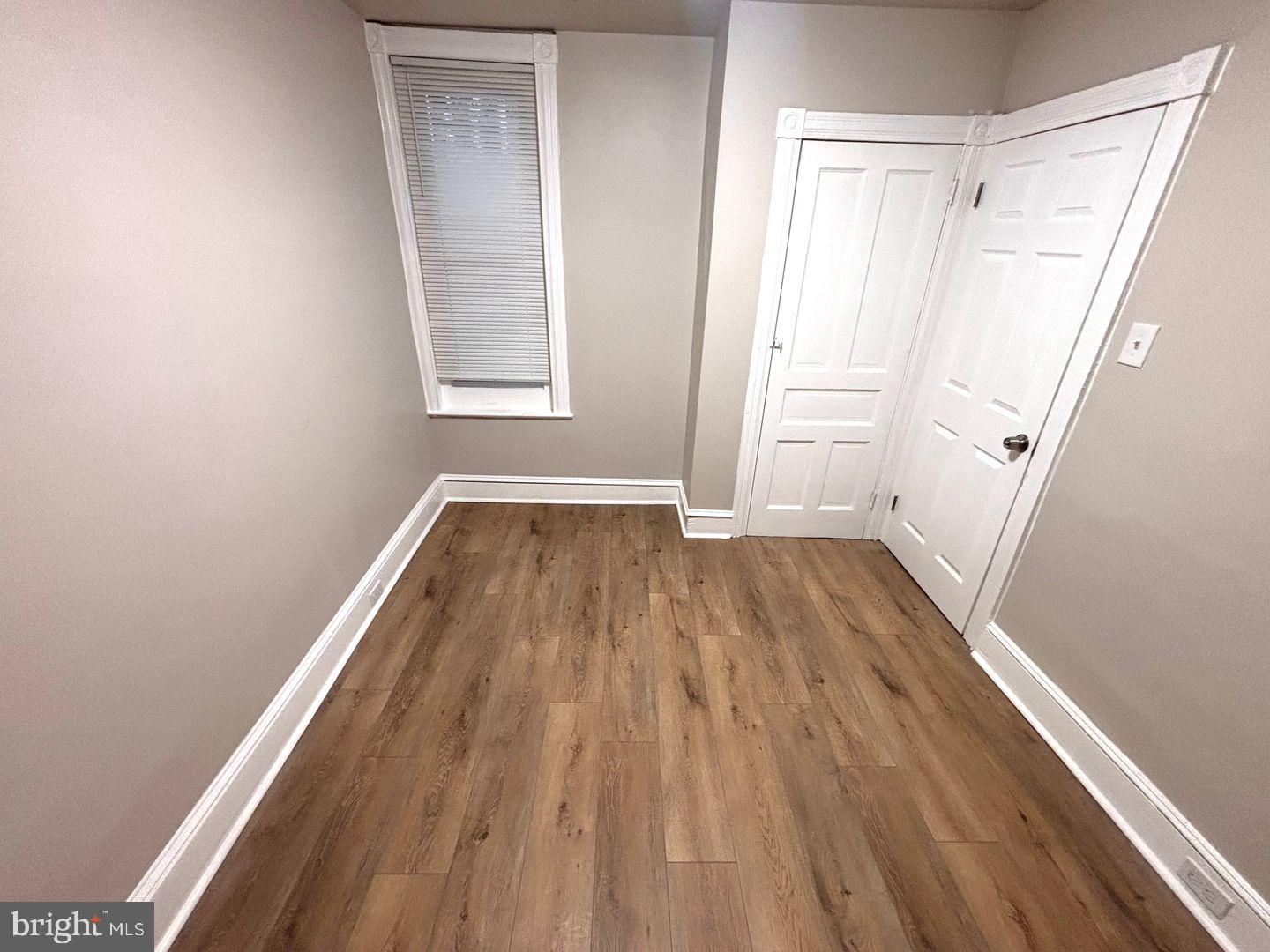 3023 Redner Street Philadelphia, PA 19121 - Photo 7 of 22 a view of a room with wooden floor and staircase