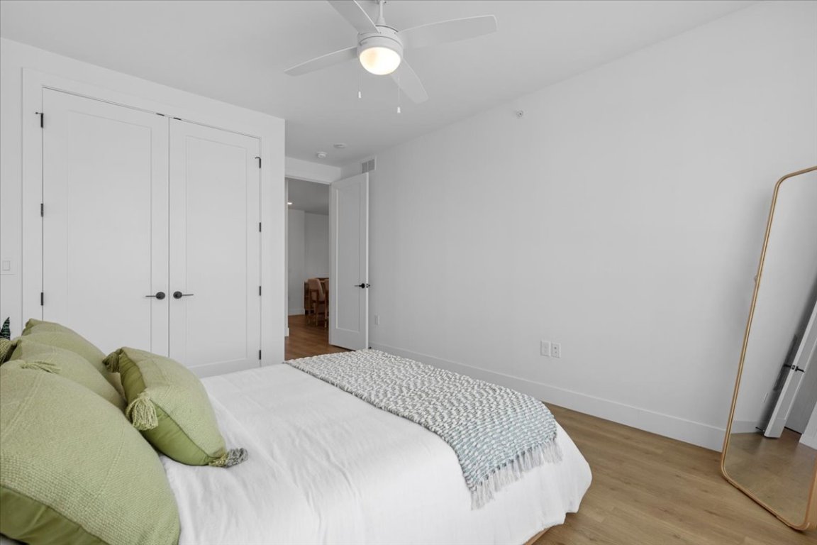 1701 Simond Avenue, Unit 636 Austin, TX 78723 - Photo 11 of 34 a bedroom with a bed and a window