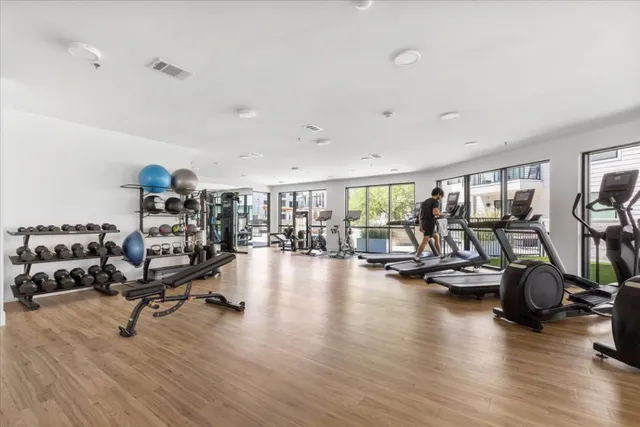 a view of a lake from balcony with furniture