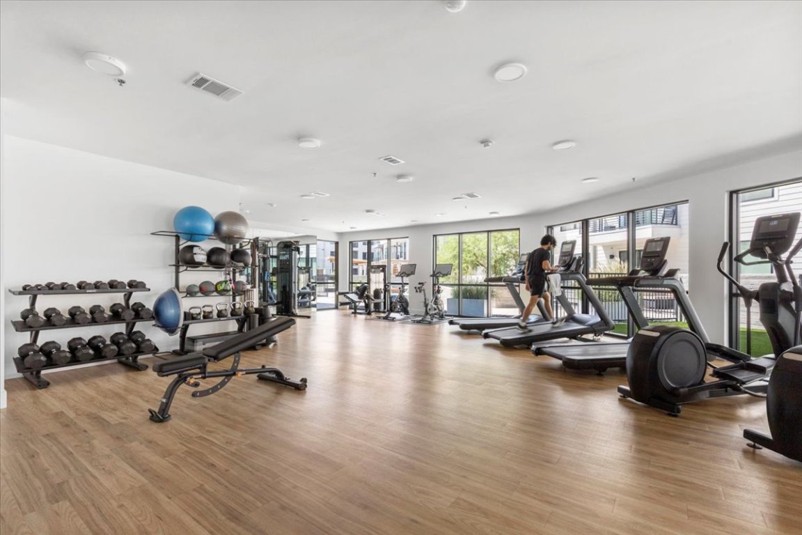 1701 Simond Avenue, Unit 636 Austin, TX 78723 - Photo 24 of 34 a view of a room with gym equipment