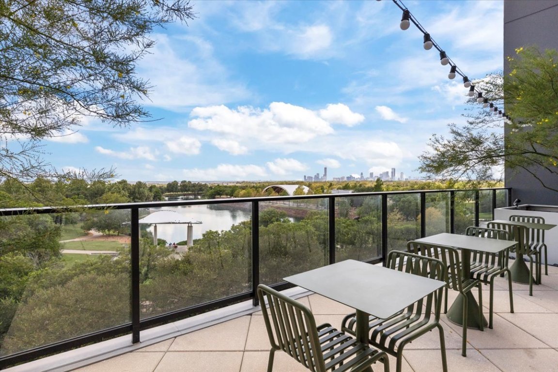 1701 Simond Avenue, Unit 636 Austin, TX 78723 - Photo 25 of 34 a view of a lake from balcony with furniture