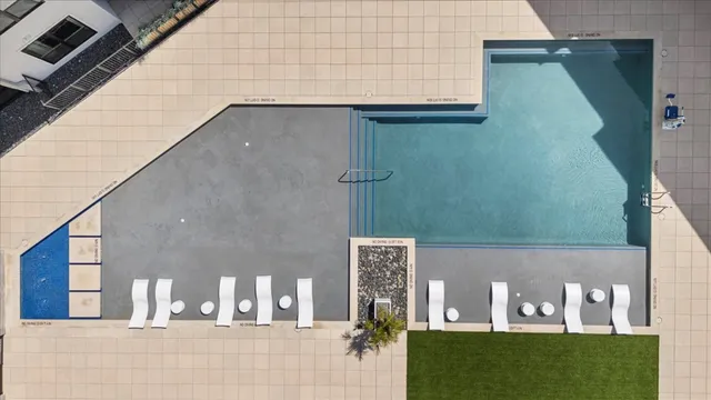 a front view of a building with parking