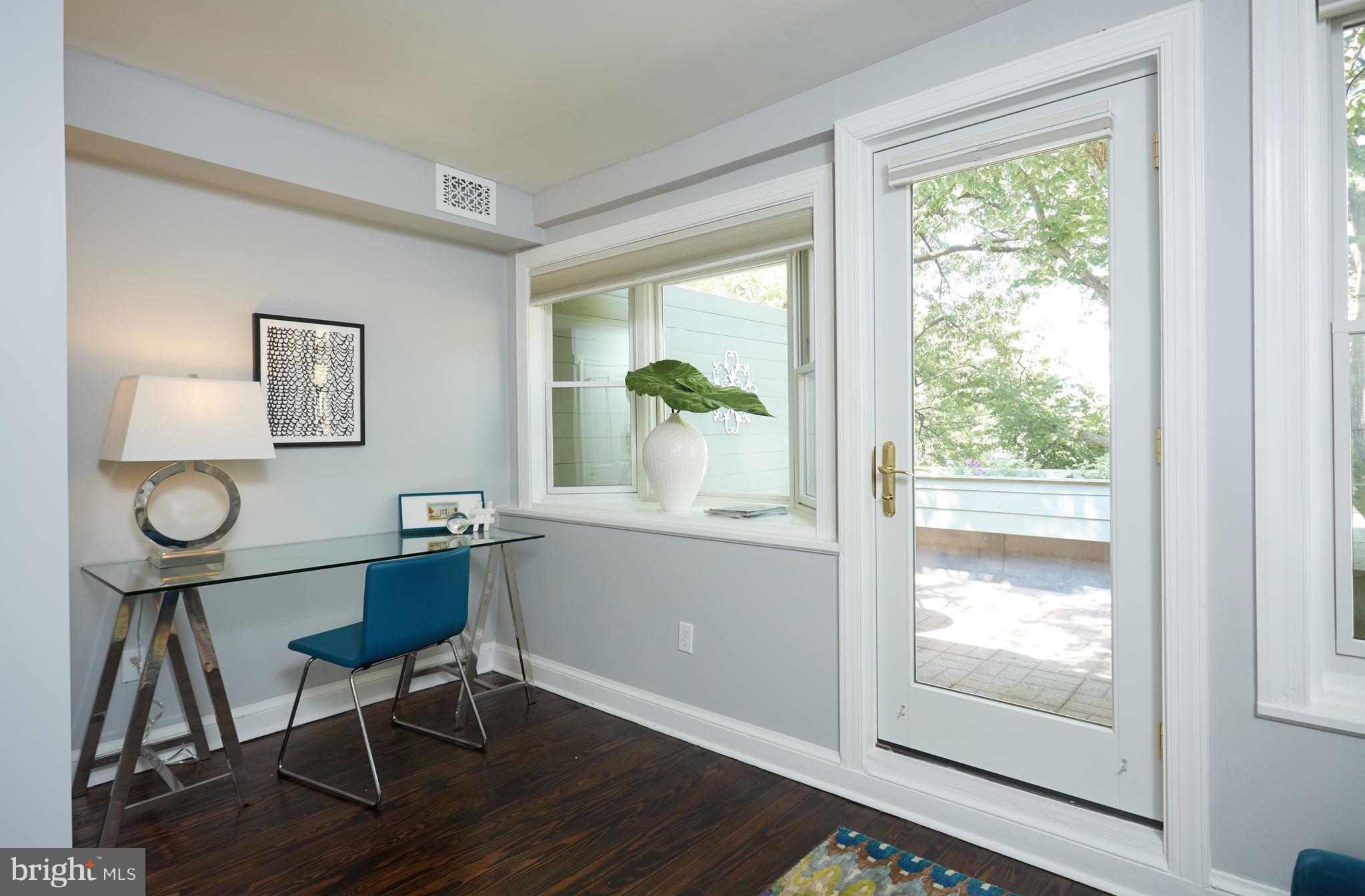 1822 16th Street Northwest Washington, DC 20009 - Photo 18 of 29 a workspace with wooden floor and a window