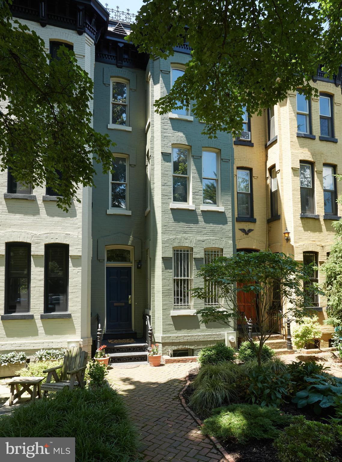 1822 16th Street Northwest Washington, DC 20009 - Photo 28 of 29 a front view of a house with a yard