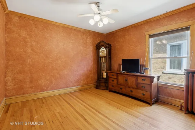 a view of a livingroom with furniture and a flat screen tv