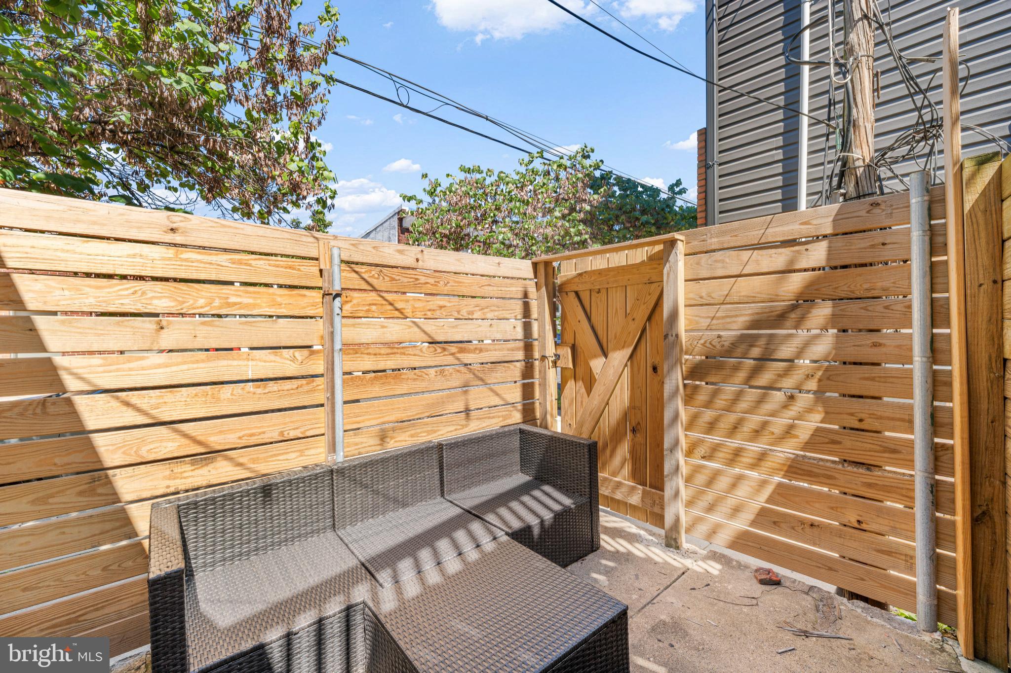 2501 East Norris Street Philadelphia, PA 19125 - Photo 25 of 25 Private outdoor retreat with wooden fencing.