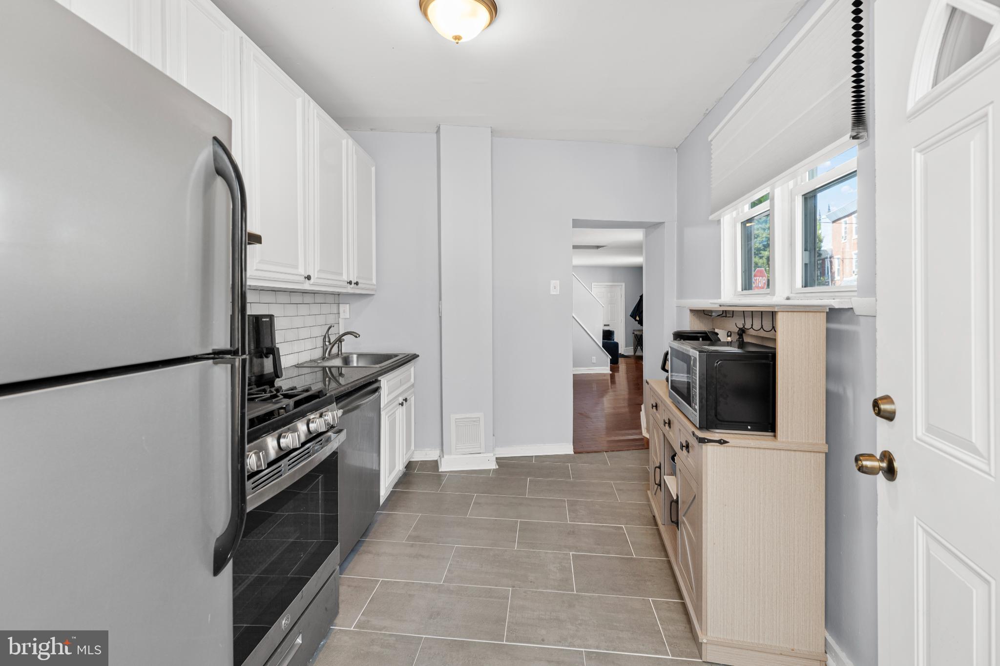 2501 East Norris Street Philadelphia, PA 19125 - Photo 8 of 25 Modern kitchen with sleek appliances.