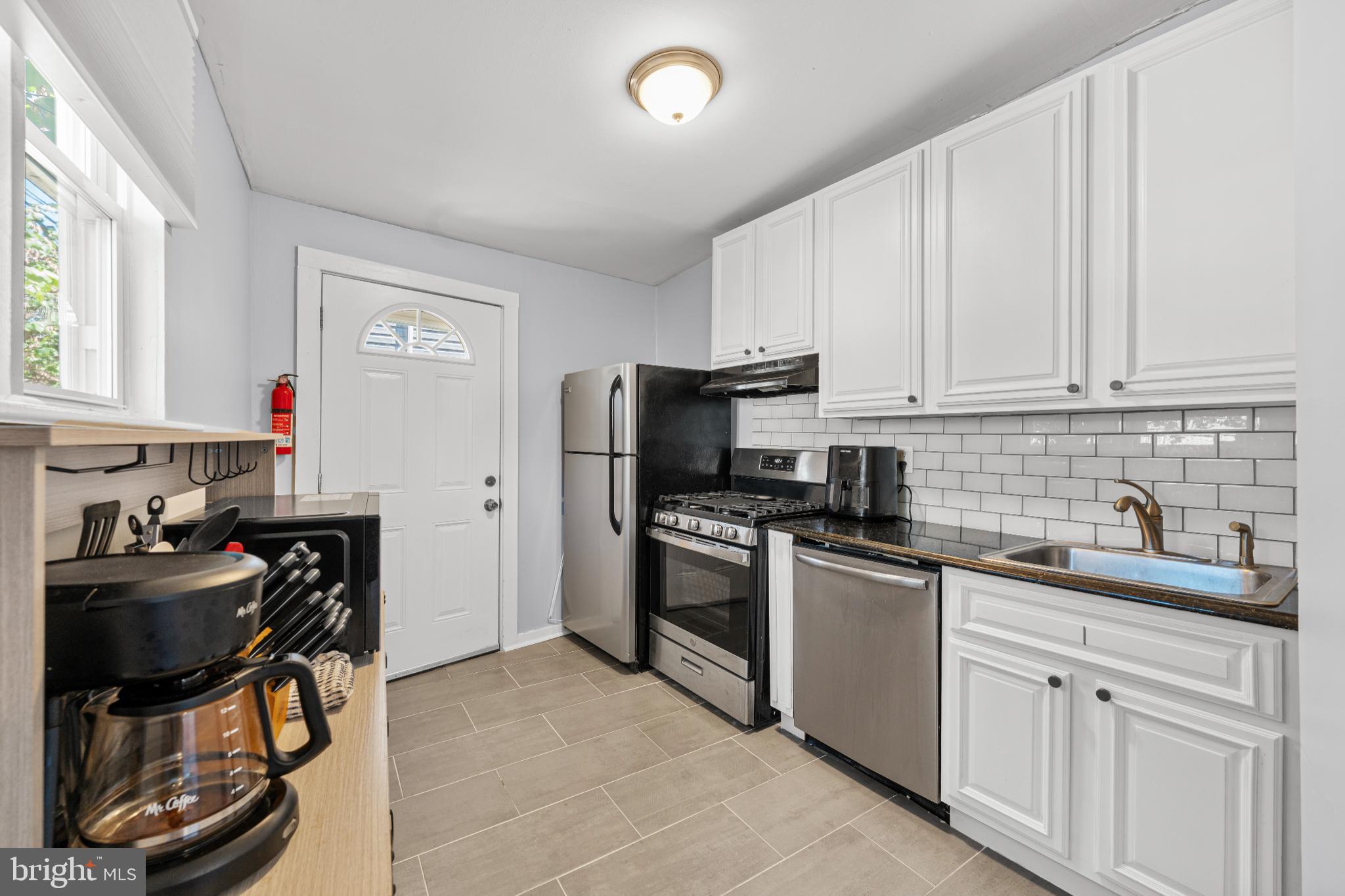 2501 East Norris Street Philadelphia, PA 19125 - Photo 9 of 25 Modern kitchen with sleek finishes.