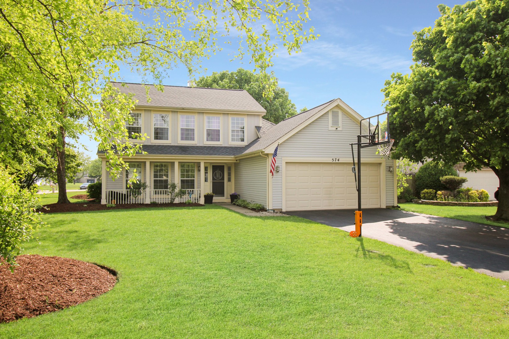 574 Foxford Road Bartlett, IL 60103 - Photo 1 of 22 a view of a house with a yard and tree