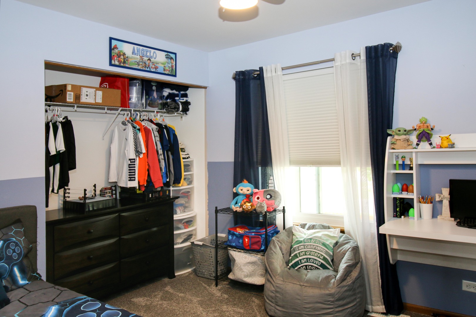 574 Foxford Road Bartlett, IL 60103 - Photo 18 of 22 a bed room with a bed and a window