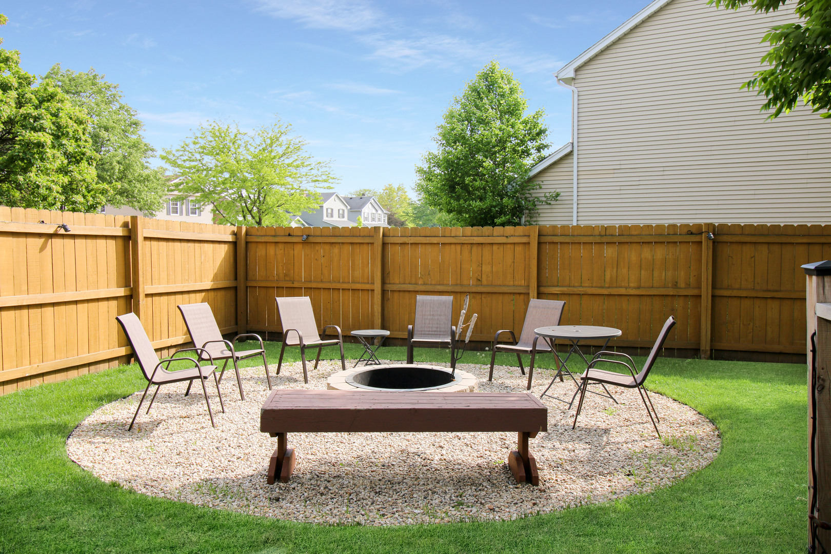 574 Foxford Road Bartlett, IL 60103 - Photo 3 of 22 a view of a chairs and table in the garden