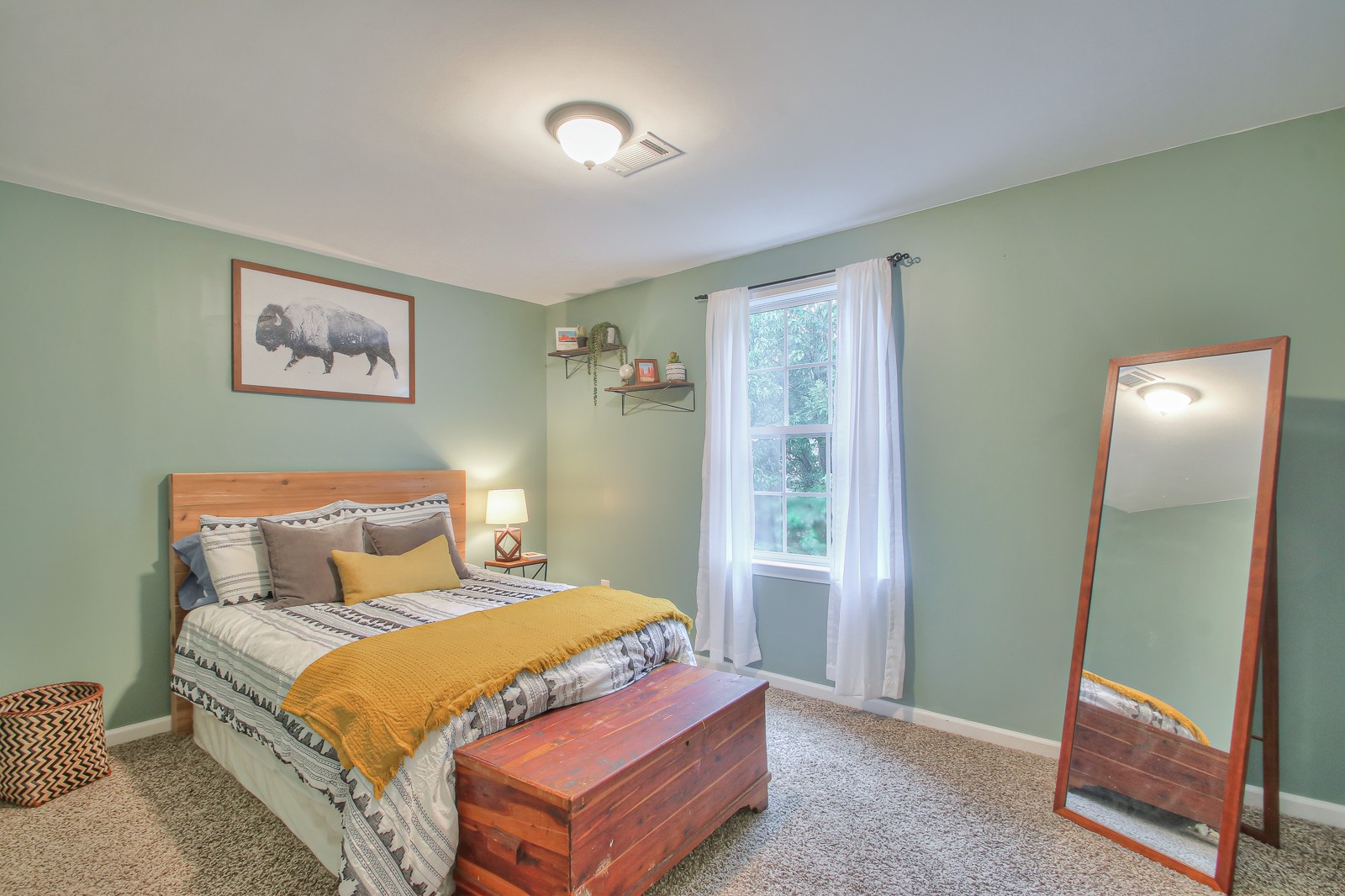 7481 Christopher Street Fairview, TN 37062 - Photo 12 of 42 a bedroom with a large bed and a window