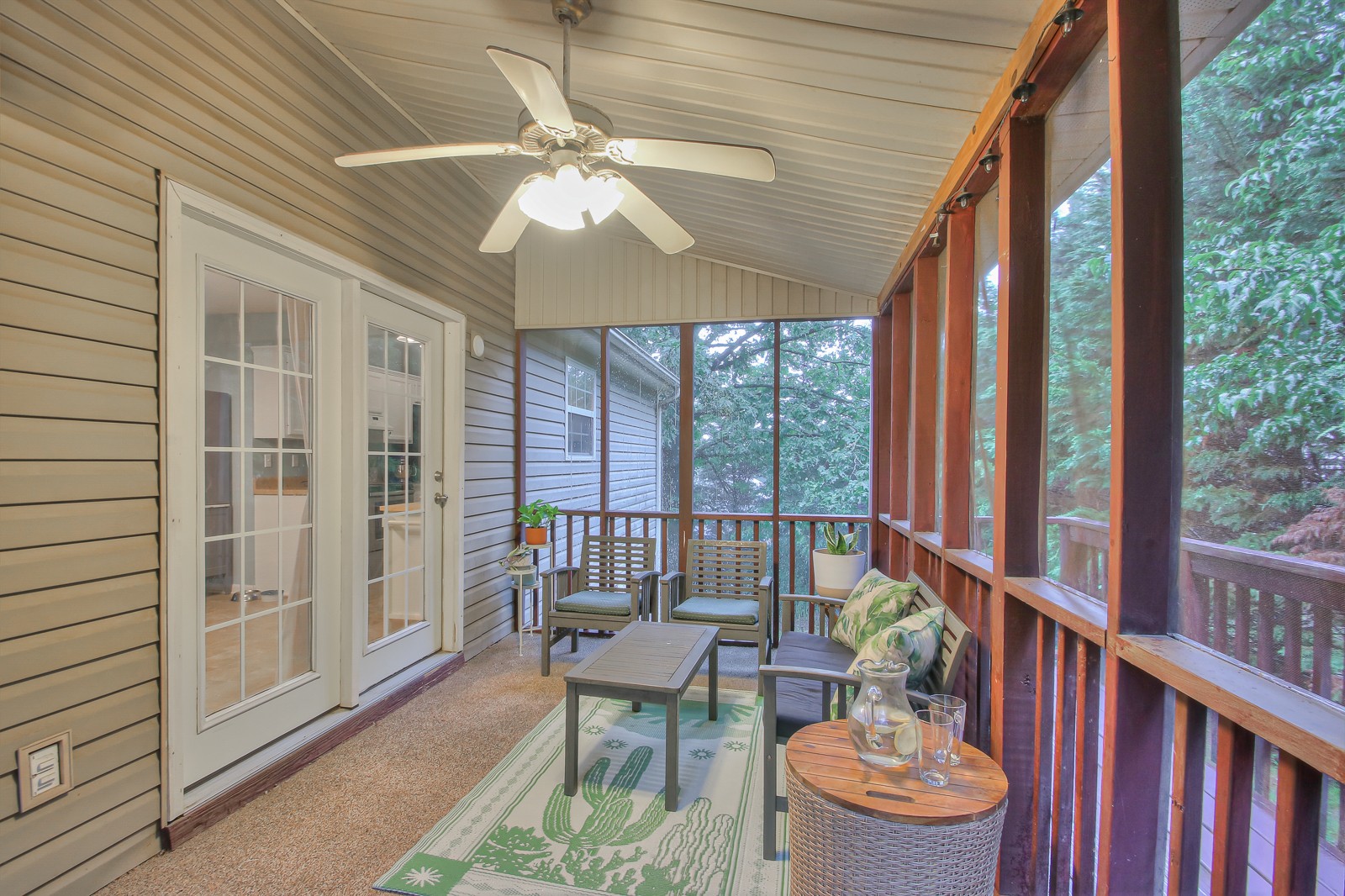 7481 Christopher Street Fairview, TN 37062 - Photo 38 of 42 a view of a balcony with furniture and wooden floor