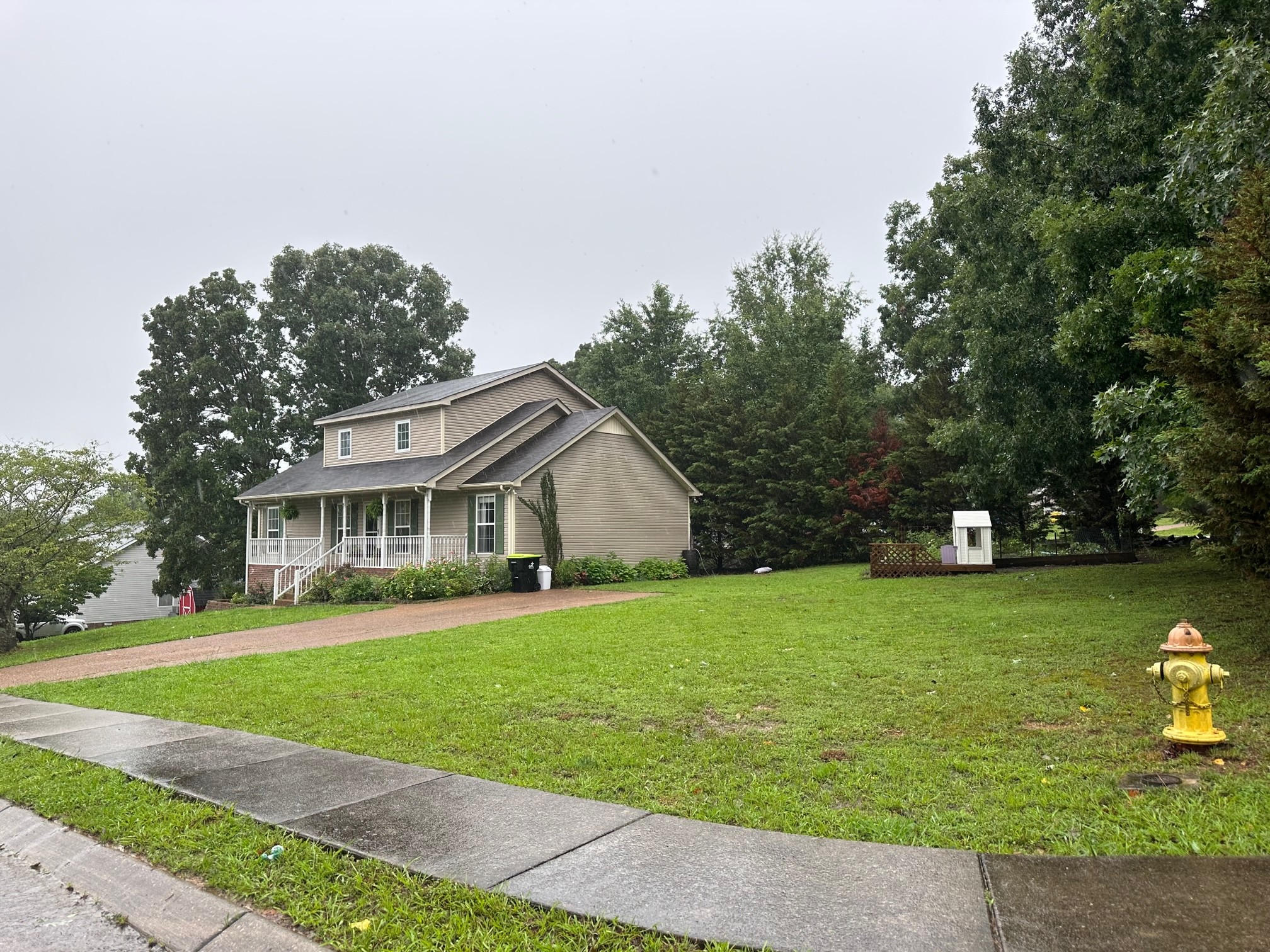7481 Christopher Street Fairview, TN 37062 - Photo 41 of 42 a front view of a house with garden